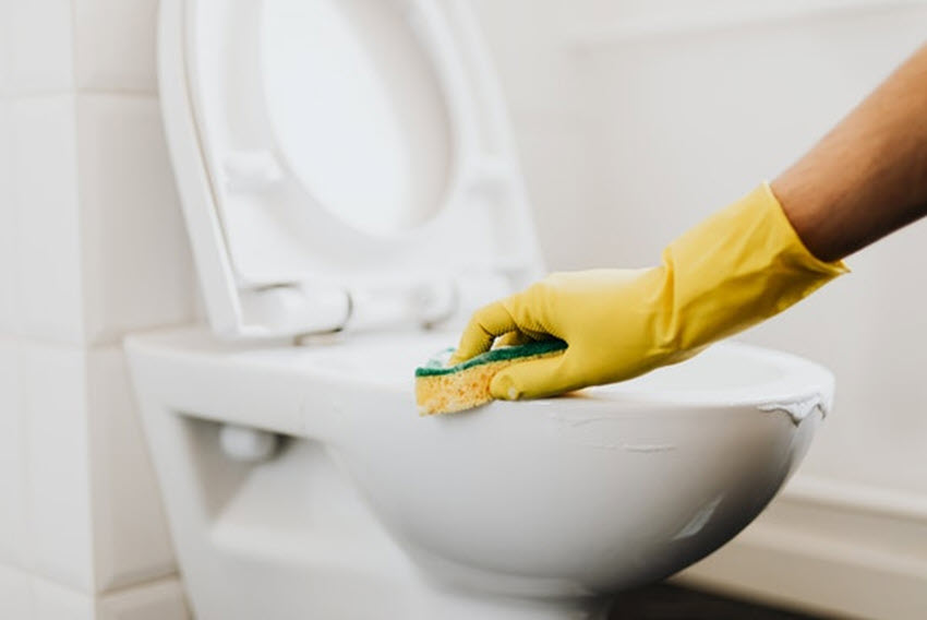 cleaning toilet in Scottsdale